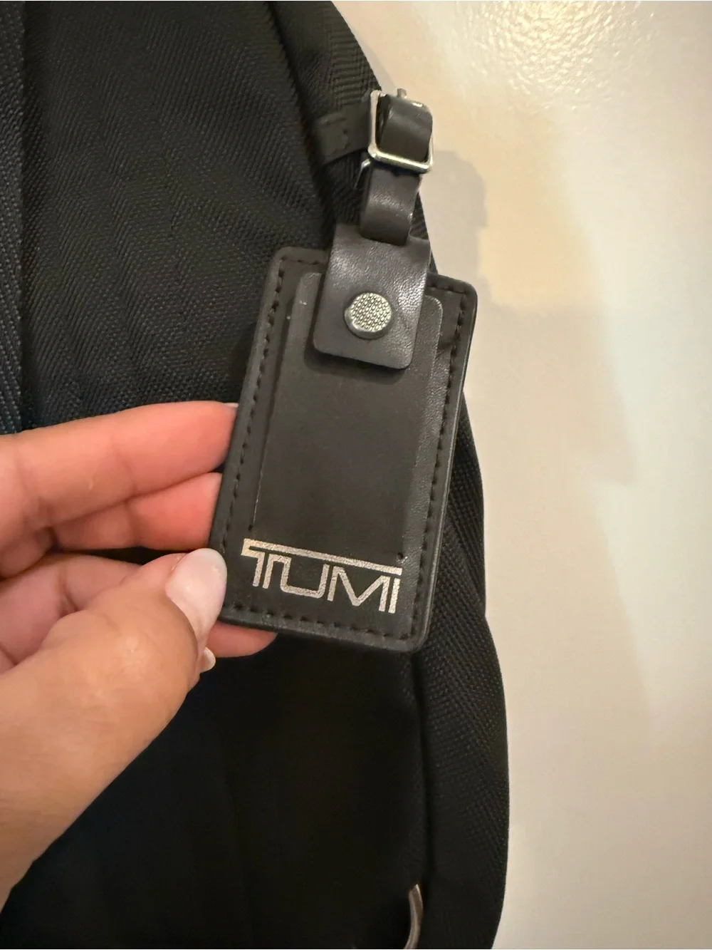 Tumi Black Men's Sling Belt Bag with Silver Hardware
